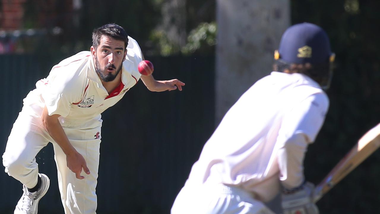 Grade cricket match between Adelaide and Sturt at Glandore Oval. Cameron Valente (State player) bowling for Adelaide to Sturt's Tom Kelly.16 February 2019. (AAP Image/Dean Martin)