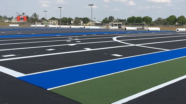 Progression of the old artificial turf being stripped and the new turf being installed at the Mackay Hockey grounds.