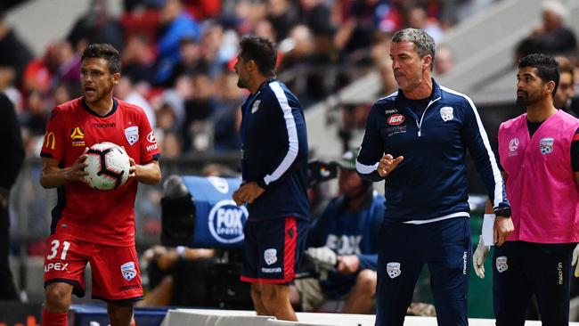 United player Mirko Boland in front of United head coach Marco Kurz on Saturday. Picture: AAP Image/David Mariuz