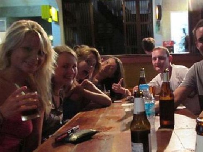 Last picture ... Hannah (left) and David (second right) with David’s friend Chris Ware (third right) on the evening the pair were murdered on the Thai island of Koh Tao. The picture was taken an estimated three hours before the murder took place. Picture: AAP