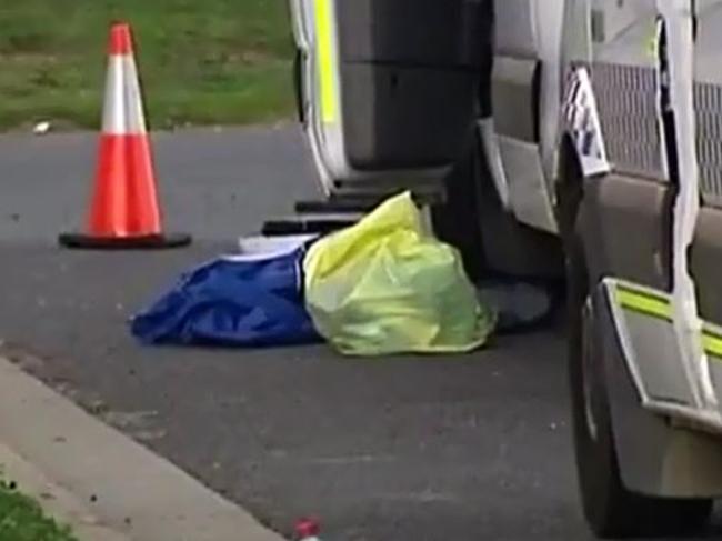 Bags, believed to be evidence, at the murder scene.