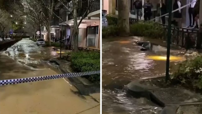 Luxury car swallowed by huge sinkhole