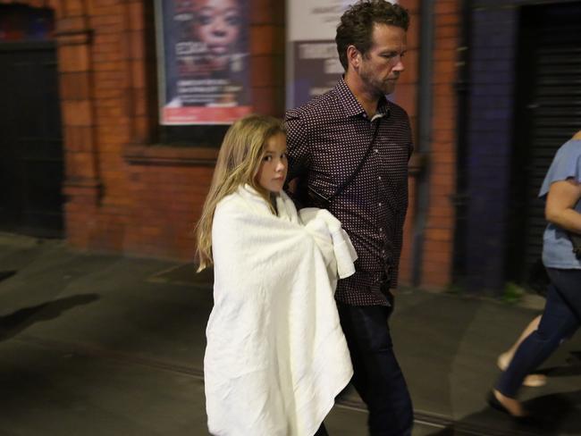 A father and his daughter leaving the Manchester Arena. Picture: Getty
