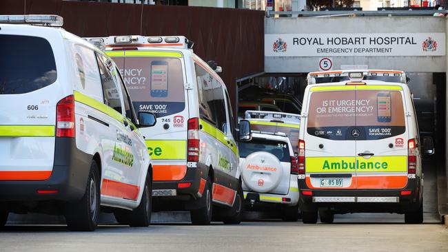 Ambulances line up on the ramp leading to the Royal Hobart Hospital emergency department entrance. Picture: NIKKI DAVIS-JONES