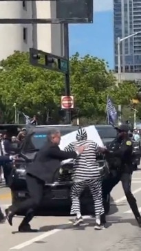 Wild protests outside Trump's court hearing