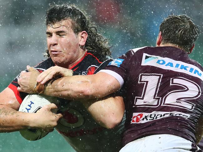 PERTH, AUSTRALIA - JULY 16: Charlie Gubb of the Warriors is tackled by Jamie Buhrer of the Sea Eagles during the round 19 NRL match between the Manly Sea Eagles and the New Zealand Warriors at nib Stadium on July 16, 2016 in Perth, Australia. (Photo by Brendon Thorne/Getty Images)