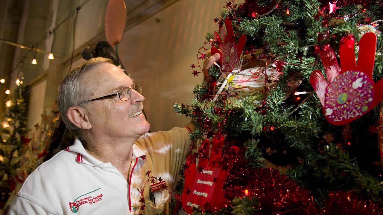 Organiser Stephen Buckley alongside a tree designed by Rockville State School students at the Toowoomba Christmas Tree Festival at St Luke's Anglican Church, Saturday, December 08, 2012. Photo Kevin Farmer / The Chronicle