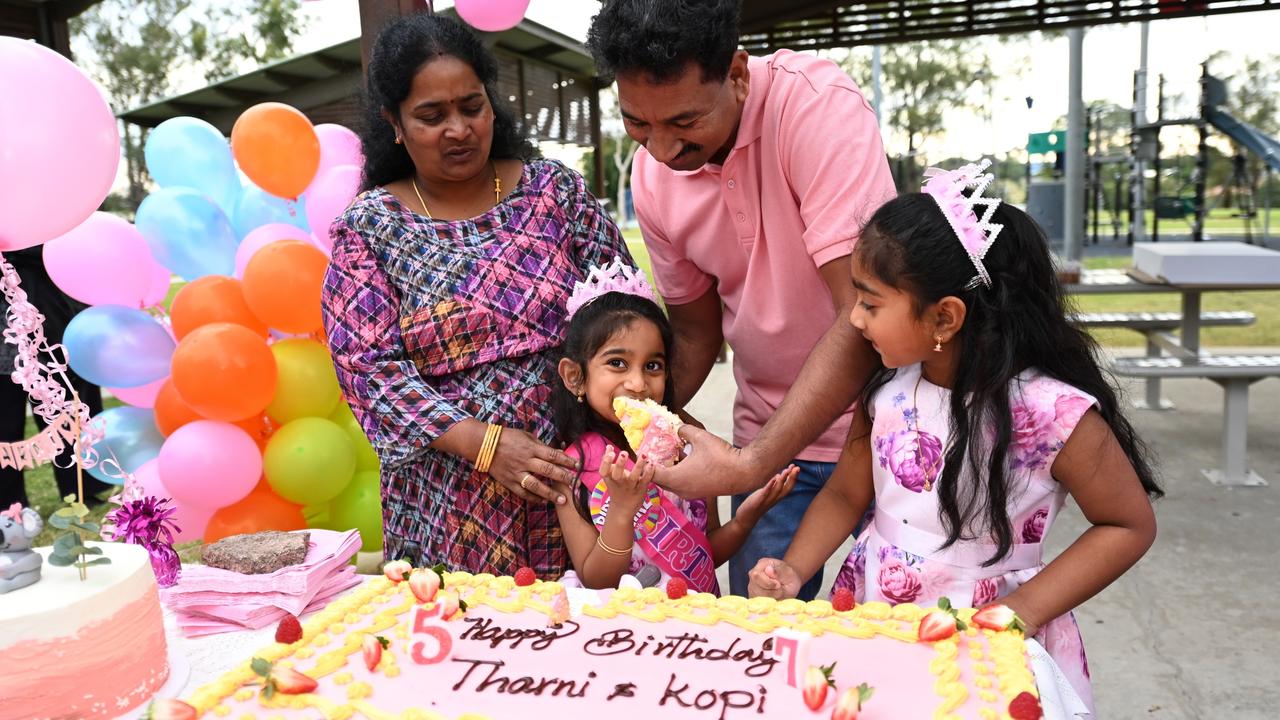 Tharnicaa Nadesalingam celebrates her fifth birthday with her parents, Priya and Nades, and her sister, Kopika, on June 12 after their return home to Biloela four years after they were removed and placed in immigration detention. Picture: Getty Images