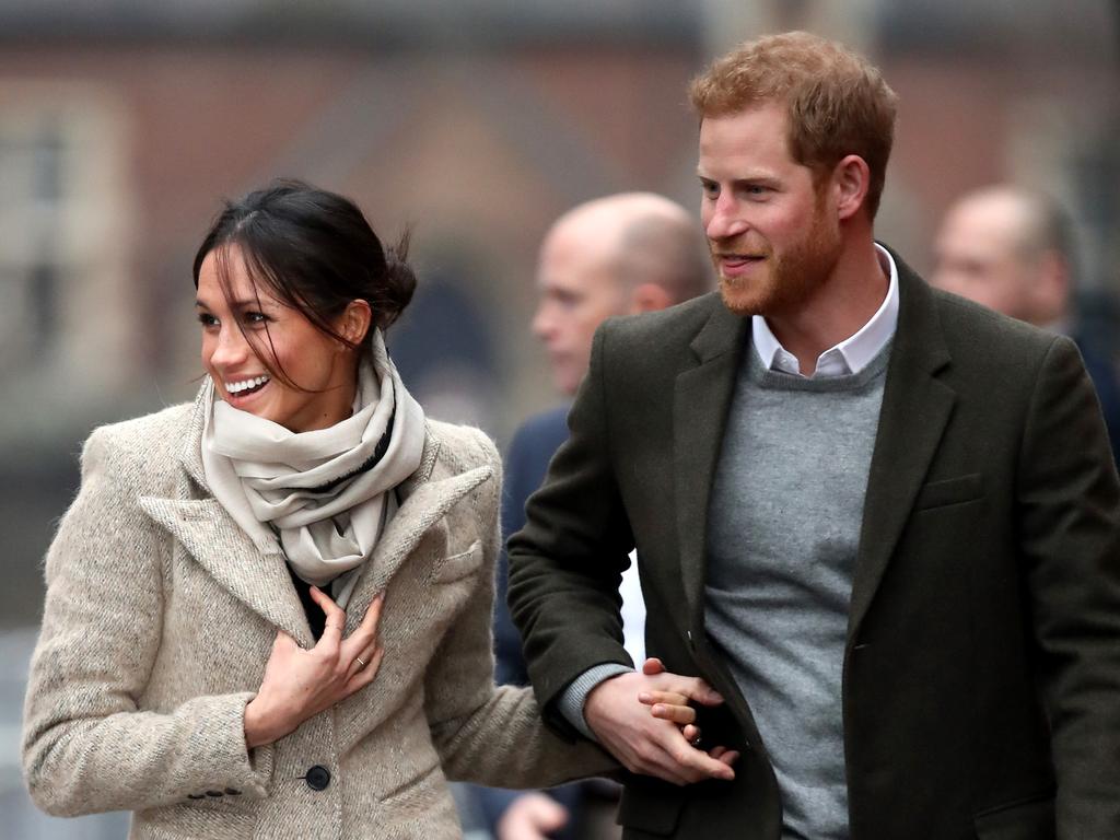 Prince Harry (R) and his fiancee Meghan Markle visit Reprezent 107.3FM on January 9, 2018 in London, England. The Reprezent training programme was established in Peckham in 2008, in response to the alarming rise in knife crime, to help young people develop and socialise through radio. Picture: Getty Images