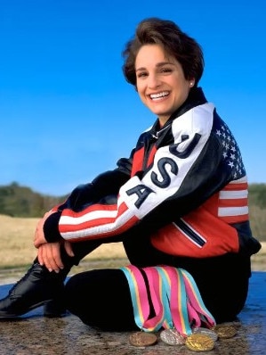 Retton with her Olympics medals in 2000. Photo: Getty.