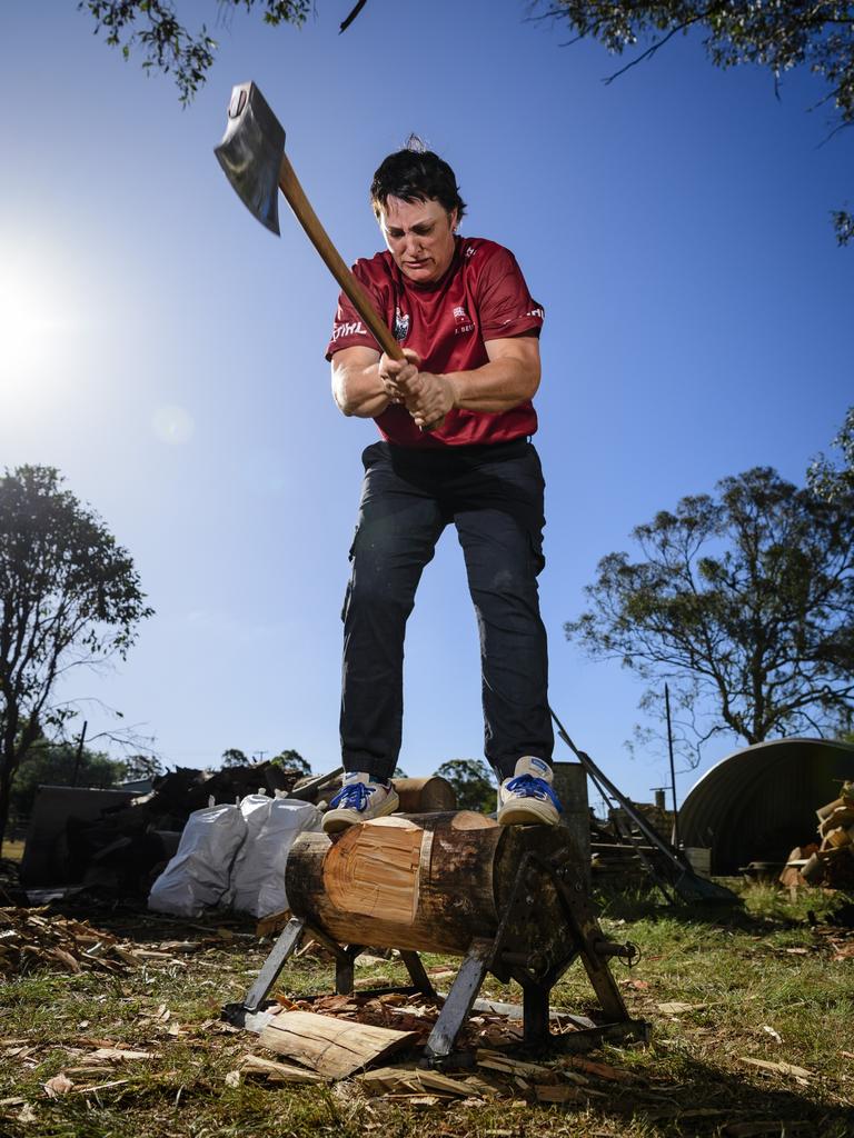 Crows Nest competitive woodchopper Jodie Beutel trains in the underhand chop in preparation for the Stihl Timbersports Australian Womens Championship in South Australia next month. Picture: Kevin Farmer