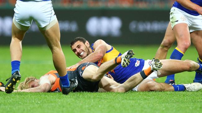 Adam Kennedy was knocked out after being slammed into the turf in a tackle. Picture: Getty