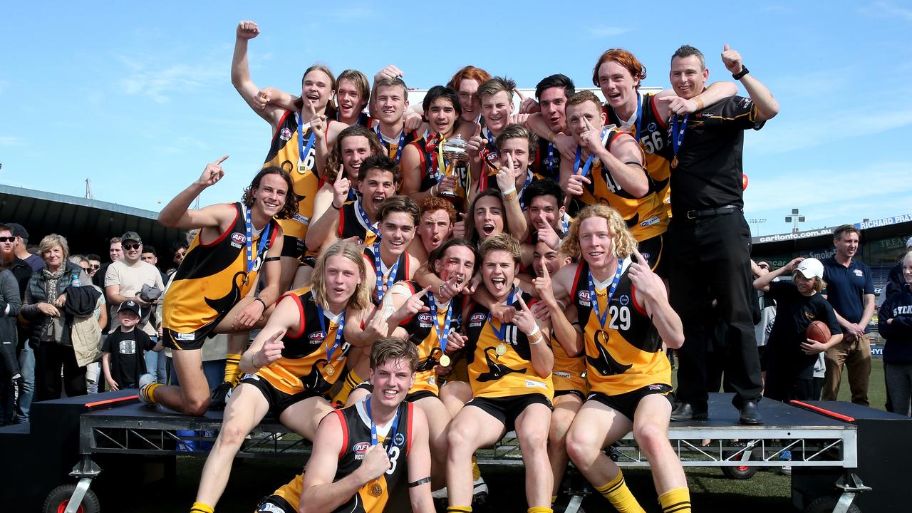 Stingrays players celebrate their TAC Cup Grand Final win.