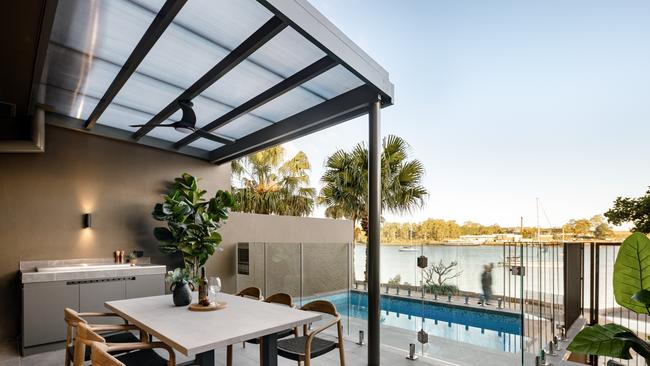 One lucky buyer of 72 Parkside Circuit, Hamilton will enjoy sipping on a glass of red overlooking the Brisbane River and the heated pool. Photo: Arin Ozdemir