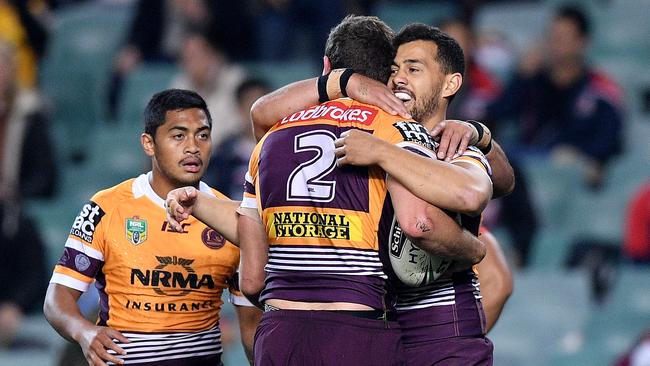 Corey Oates celebrates a try for the Broncos. Picture: AAP