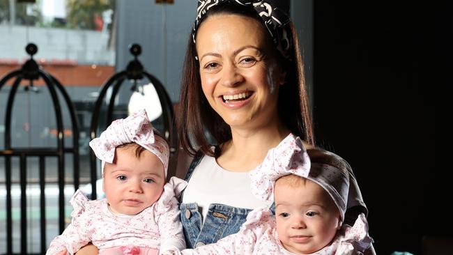 Red Wiggle Caterina Mete with her daughters Dolly And Gigi, 5 months, Brisbane. Picture: Liam Kidston