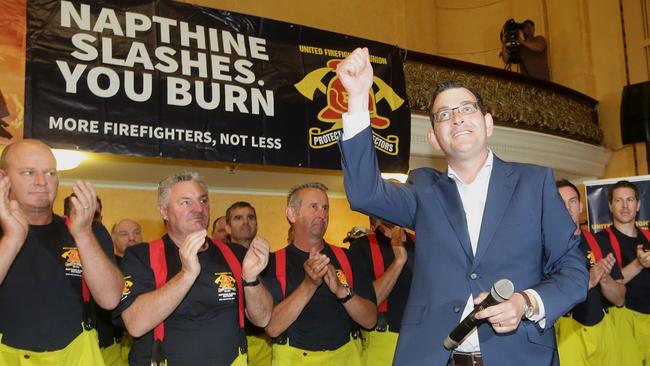 Daniel Andrews campaigning with firefighters at the Collingwood Town Hall in 2014. Picture: Hamish Blair