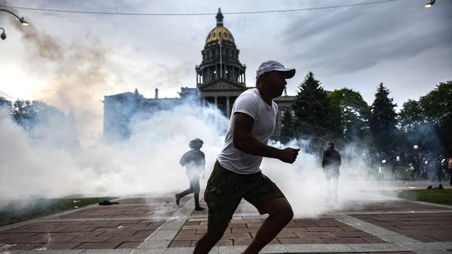 Scenes in Denver, Colorado. Governor Jared Polis activated the Colorado National Guard in hopes of stopping protests that have wreaked havoc across the city. Picture: Getty