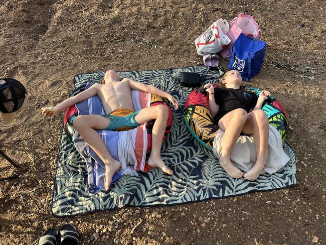 Oli and Eden asleep on their floaties after a hard day swimming in the river at English bridge. Picture: Jess McLeod, Bendigo.