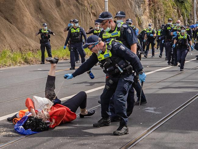 Police sprayed a woman in the face. Picture: Jason Edwards