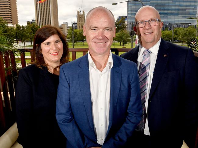 New Tour Down Under Race Director Stuart O'Grady pictured with Hitaf Rasheed (EXECUTIVE DIRECTOR, EVENTS SOUTH AUSTRALIA) and David Ridgway (Minister for Trade, Tourism and Investment) overlooking Victoria Square, Adelaide on Tuesday 3 December 2019. It has been announced that Stuart O'Grady is taking over the role from Mike Turtur.(AAP Image/Sam Wundke)