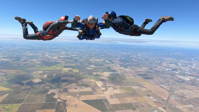 MIDDLE MAN: Graham Barrington, 81, falling solo with fellow club members Marcus Priem and Al Gray. Pictures: Shane Strudwick