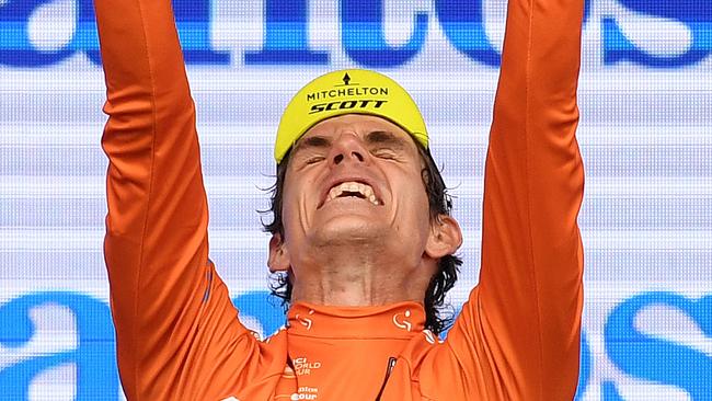 South African rider Daryl Impey of team Mitchelton-Scott celebrates winning the Tour Down Under in Adelaide, Sunday, January 21, 2018. (AAP Image/Dan Peled) NO ARCHIVING, EDITORIAL USE ONLY