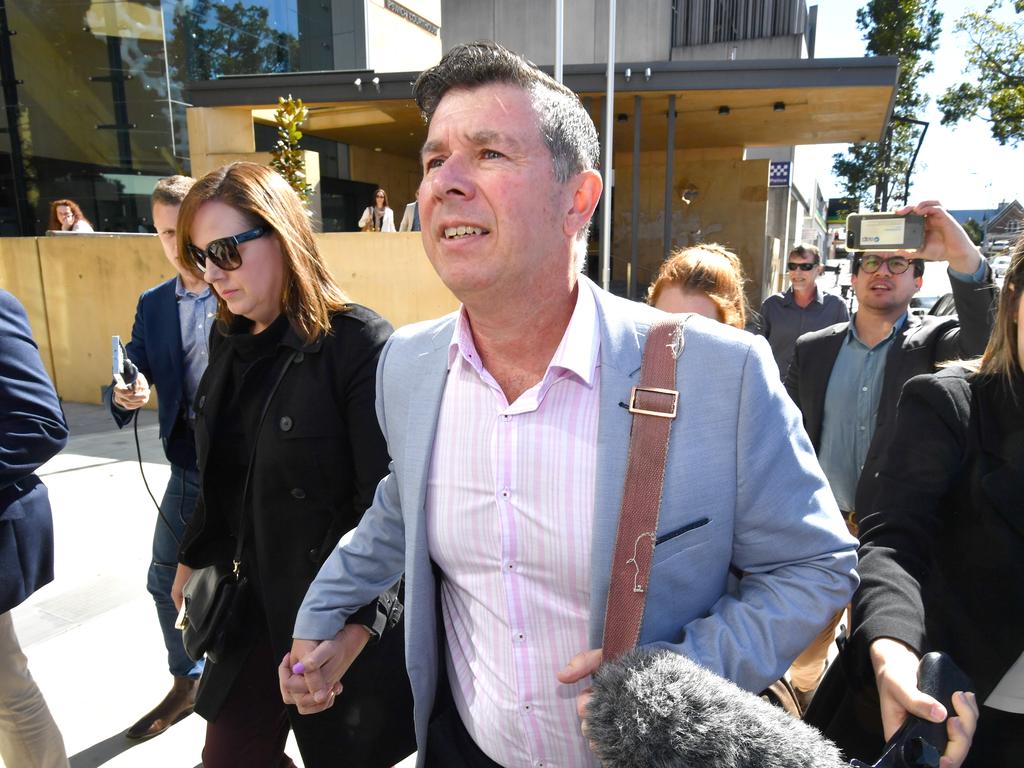 Former Ipswich Mayor Andrew Antoniolli and his wife Karina leave the Ipswich Magistrates Court during his trial in 2019.