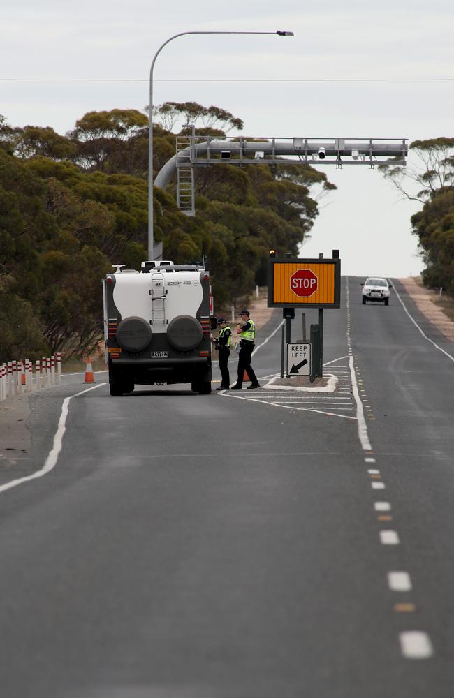 South Australian Police stopping vehicles near the SA border 5kms east of Pinnaroo, South Australia.