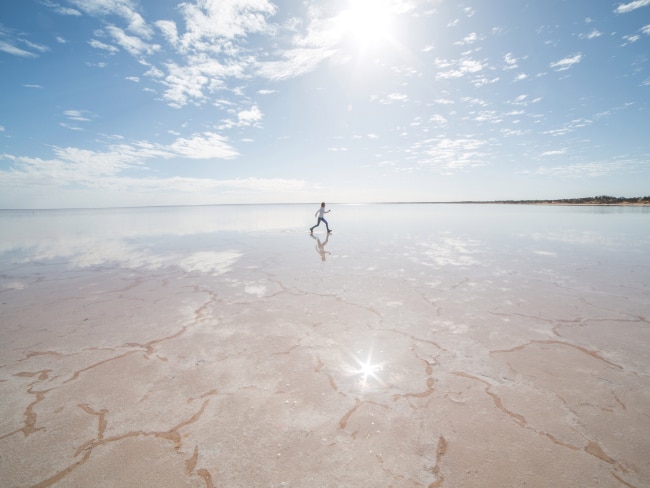 <span>28/50</span><h2>Kati Thanda-Lake Eyre, SA</h2><p>The largest salt lake in Australia, <a href="https://www.escape.com.au/destinations/australia/south-australia/worth-travelling-for-halligan-bay-lake-eyre/news-story/6bba4bfc817880c08eda13d88338aac8" target="_blank" rel="noopener">Kati-Thanda-Lake Eyre </a> is a veritable Dead Sea, being the lowest point in the country. It might seem eerie and desolate to some, but if the visit is timed just right to correspond with rainfall, you’ll see the whole place spring to life. Greens burst into colour and animals like pelicans, fish and banded stilts are drawn to the rising waters.</p>