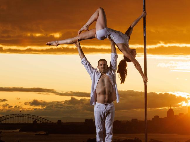 DAILY TELEGRAPH JUNE 8, 2023.  EMBARGOED FOR THE DAILY TELEGRAPH SUN 4 MON PLEASE CONTACT PIC EDITOR ROHAN KELLY BEFORE PUBLISHING. Pole Dancers Suzie Q and partner Toby J pictured at Dover Heights with Sydney in the background. Picture: David Swift