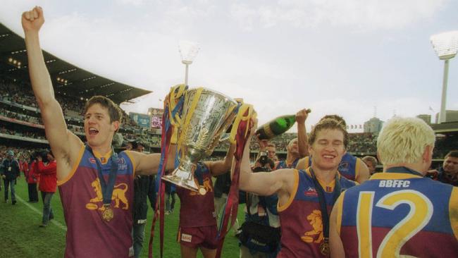 Aaron Shattock and Luke Power with the premiership cup. 2002 Grand Final. Brisbane Lions v Collingwood. MCG.