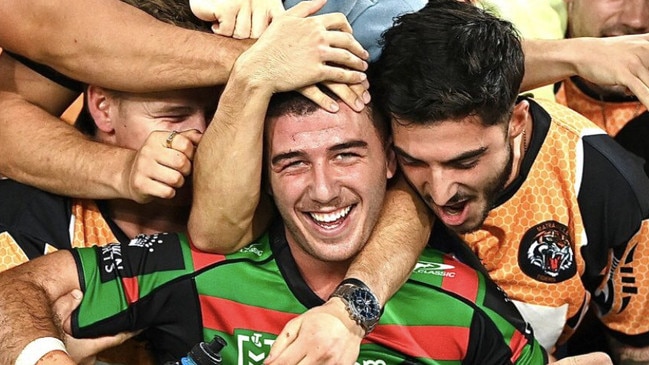 Dean Hawkins celebrates with mates.