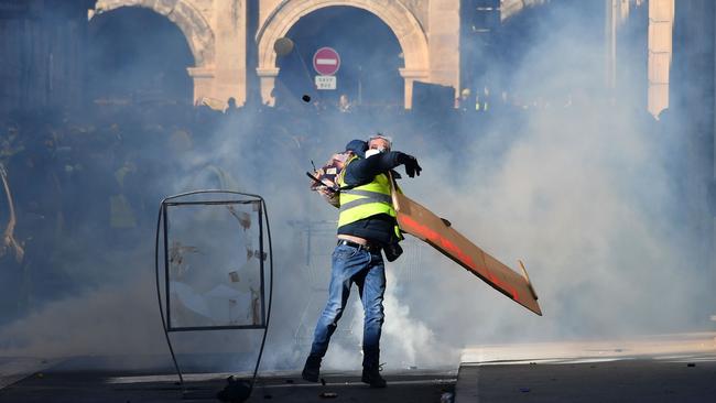 An anti-government demonstration in France by the yellow vests "Gilets Jaunes" movement. Their protests have pushed France to demand businesses pay their fair share of tax. Picture: AFP