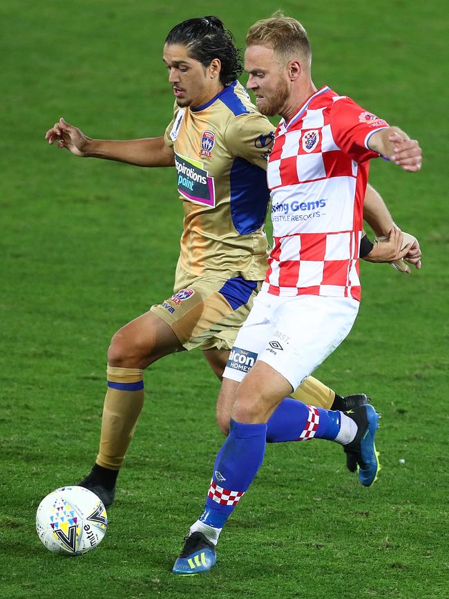 Gold Coast Knights’ Justyn McKay (right) battles Newcastle’s Kosta Petratos. Picture: Chris Hyde/Getty Images.