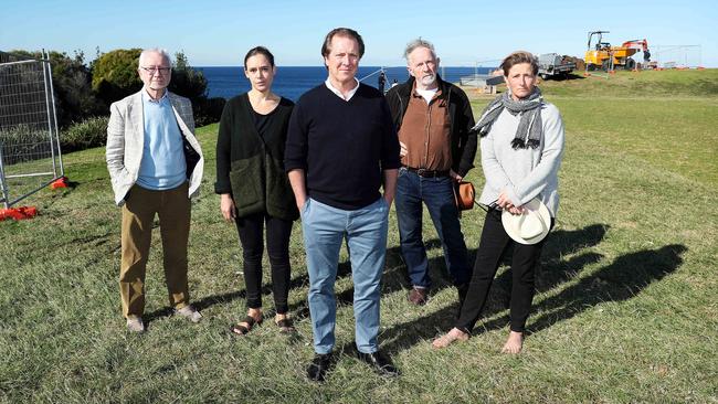 Founding director of Sculptures by the Sea David Handley (centre) with artists Ron Robertson-Swann, Lucy Humphrey, Michael Snape, Jane Gillings, at Marks Park in Bondi today where a path is being built. Picture: Tim Hunter