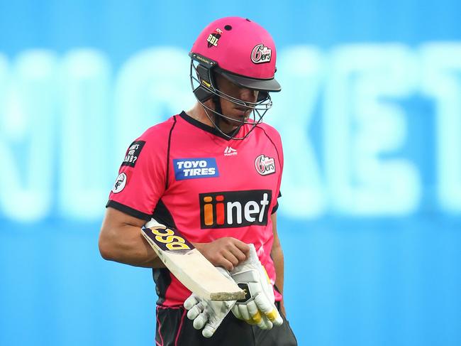 Moises Henriques of the Sixers walks from the field after being dismissed by Sandeep Lamichhane of the Stars during the Big Bash League (BBL) match between the Sydney Sixers and the Melbourne Stars at the SCG in Sydney, Thursday, December 27, 2018. (AAP Image/Brendon Thorne) NO ARCHIVING, EDITORIAL USE ONLY, IMAGES TO BE USED FOR NEWS REPORTING PURPOSES ONLY, NO COMMERCIAL USE WHATSOEVER, NO USE IN BOOKS WITHOUT PRIOR WRITTEN CONSENT FROM AAP