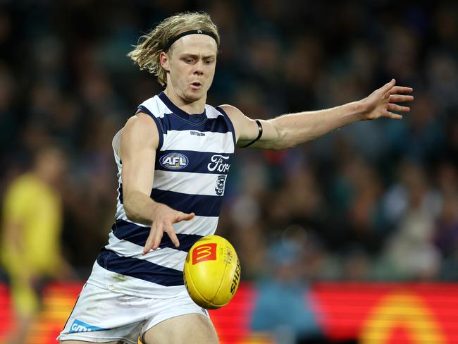 Zach Guthrie kicks long. Picture: Sarah Reed/AFL Photos via Getty Images