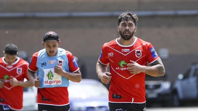 Jordan Pereira (R) sweats it out at St George Illawarra Dragons training. Picture: Dylan Robinson