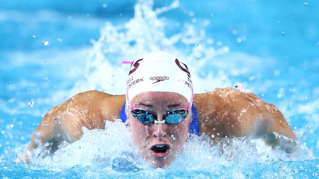 Brianna Throssell competes in the Women's 100m Butterfly heat during the 2024 Australian Swimming Trials. Picture: Chris Hyde/Getty Images.