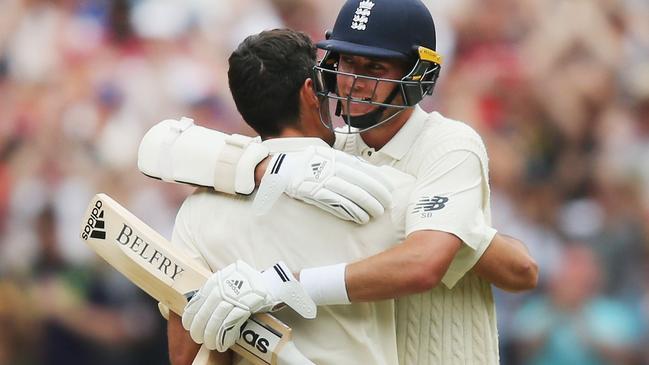 Alastair Cook, left, celebrates making his double century with Stuart Broad. Picture: Getty Images.