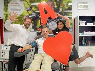 BLOOD CHALLENGE:  Red Croiss Blood service staff Scott Morison and Helen Youngberry encourage Lismore mayor Isaac Smith (centre) to give blood for the 2018 Councils Blood Challenge. Picture: Alison Paterson