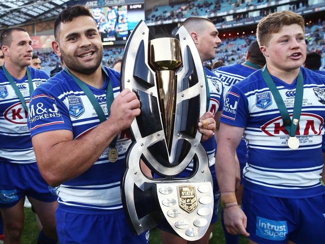 Rhyse Martin and the Bulldogs celebrate victory after the 2018 NRL Intrust Super State Championship Grand Final against the Redcliffe Dolphins. Picture: Matt King/Getty Images