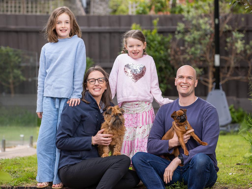 Nicole Rous and max with their children Ruby 8, Lucy 6, and dogs Pickle and Pudding. Picture: Jason Edwards.