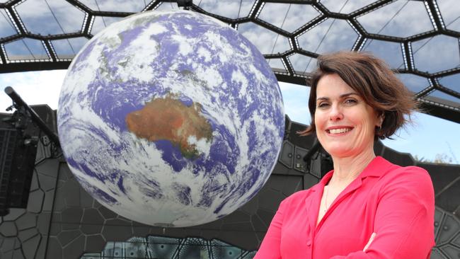 HOTA CEO Criena Gehrke next to the major earth installation. Picture Glenn Hampson