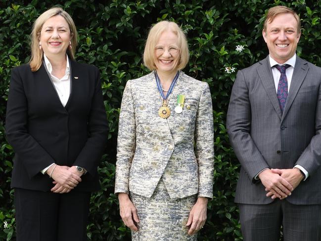 Governor Jeannette Young (centre) swears in Annastacia Palaszczuk and Steven Miles as Olympics and Paralympics Minister, and Minister Assisting the Premier on Olympic and Paralympic Games Infrastructure respectively.