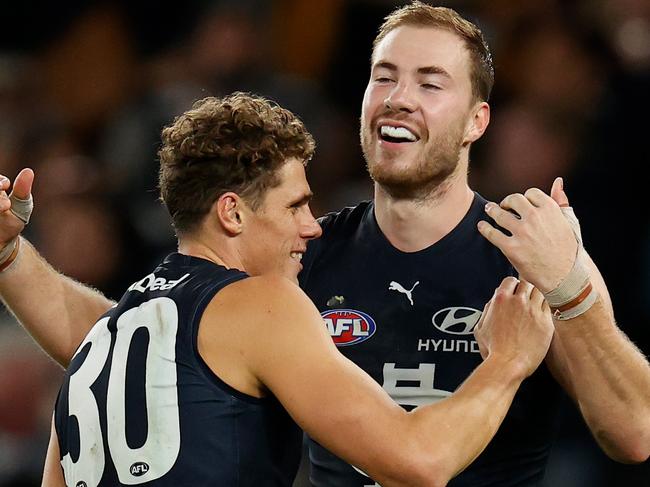 MELBOURNE, AUSTRALIA - MAY 08: Charlie Curnow (left) and Harry McKay of the Blues celebrate during the 2022 AFL Round 08 match between the Carlton Blues and the Adelaide Crows at Marvel Stadium on May 08, 2022 in Melbourne, Australia. (Photo by Michael Willson/AFL Photos via Getty Images)