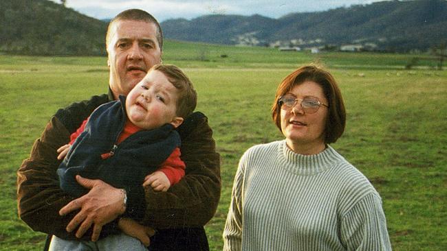 Mark Chopper Read with his wife Mary-Ann and son Charles.