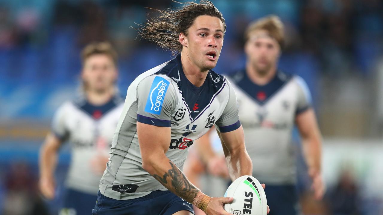 GOLD COAST, AUSTRALIA - AUGUST 19: Nicho Hynes of the Storm runs with the ball during the round 23 NRL match between the Gold Coast Titans and the Melbourne Storm at Cbus Super Stadium, on August 19, 2021, in Gold Coast, Australia. (Photo by Chris Hyde/Getty Images)