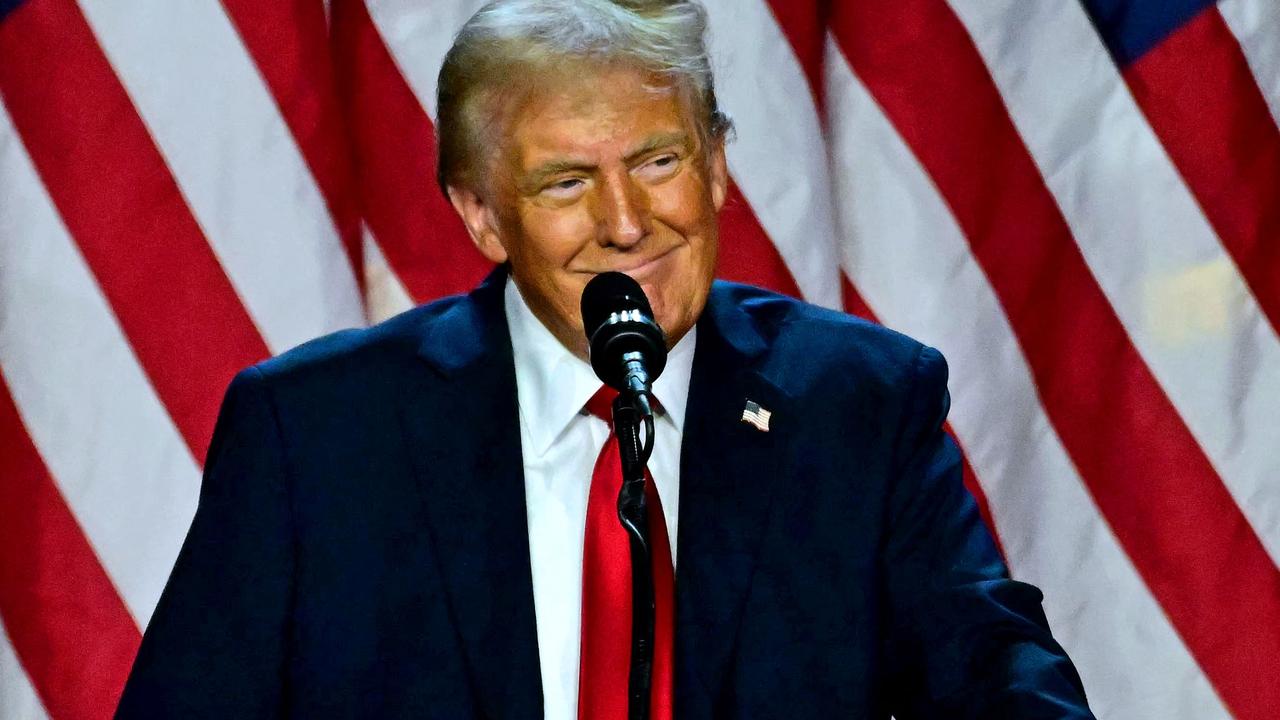 Mr Trump on stage during his election night victory speech. Picture: Jim Watson/AFP